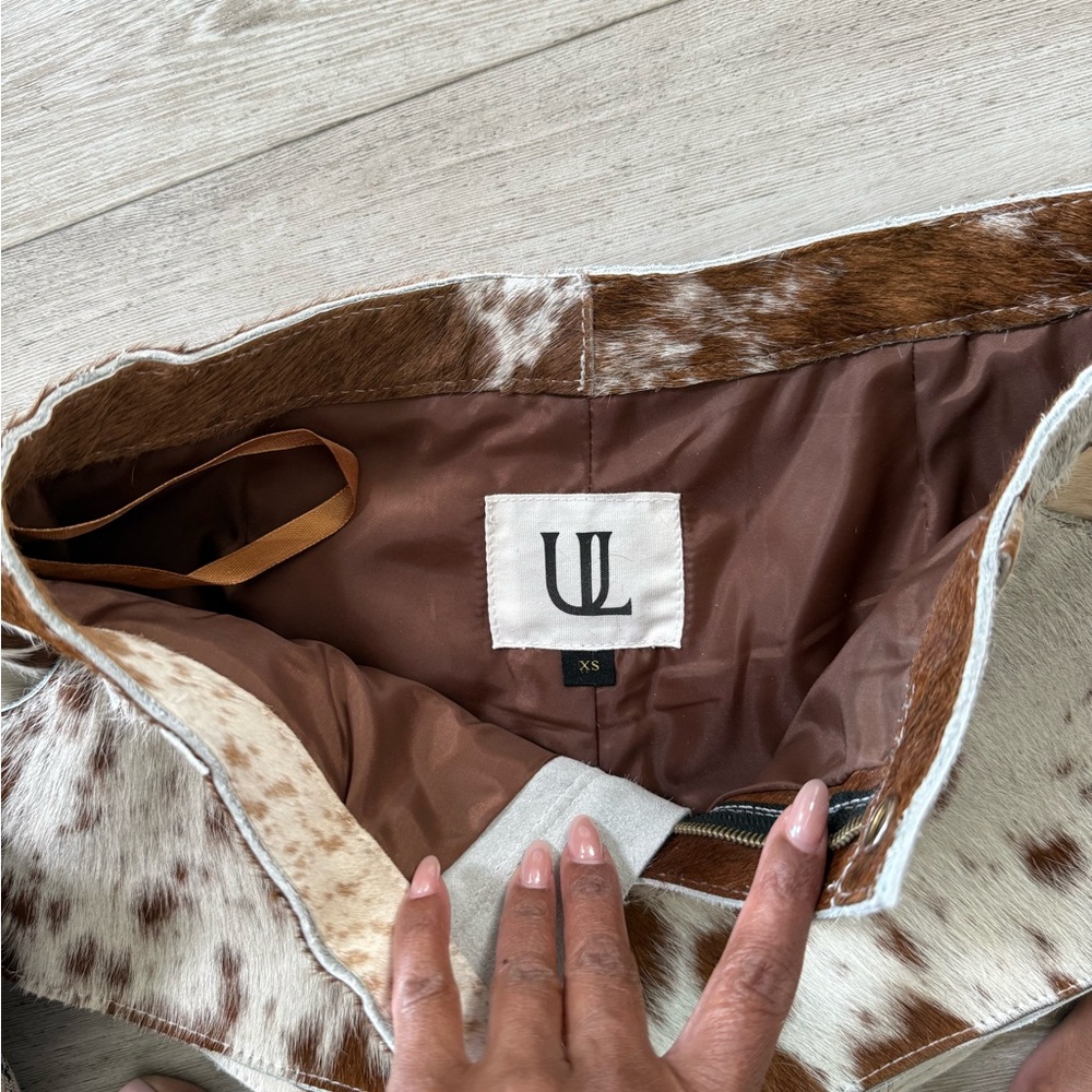 Understated Leather Cowhide x Revolve High-Rise shorts - Picture 4 of 10